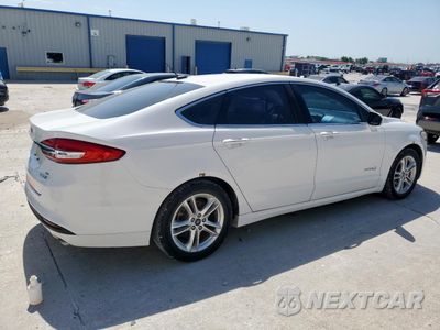 Trzecie zdjęcie samochodu z tyłu: 2018 FORD FUSION SE HYBRID VIN:3FA6P0LU4JR198321 - miniatura