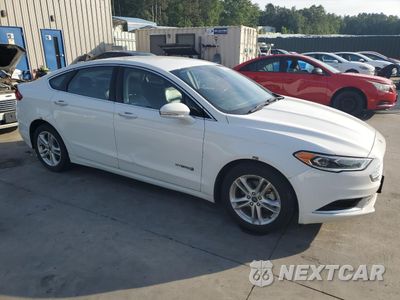 Czwarte zdjęcie samochodu z boku: 2018 FORD FUSION SE HYBRID VIN:3FA6P0LU2JR129899 - miniatura