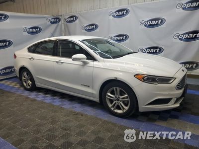 Czwarte zdjęcie samochodu z boku: 2018 FORD FUSION SE HYBRID VIN:3FA6P0LU6JR163506 - miniatura