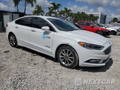 Czwarte zdjęcie samochodu z boku: 2017 FORD FUSION SE HYBRID VIN:3FA6P0LU3HR409471 - miniatura
