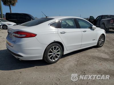 Trzecie zdjęcie samochodu z tyłu: 2017 FORD FUSION SE HYBRID VIN:3FA6P0LU2HR359601 - miniatura