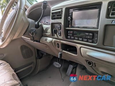 Zdjęcie 10 z 15 samochodu: 2004 FORD EXCURSION LIMITED VIN:1FMSU43P44EA56041 - miniatura