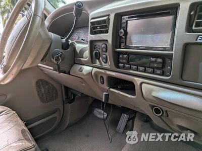 Zdjęcie 10 z 15 samochodu: 2004 FORD EXCURSION LIMITED VIN:1FMSU43P44EA56041 - miniatura