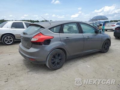 Trzecie zdjęcie samochodu z tyłu: 2012 FORD FOCUS SEL VIN:1FAHP3M21CL377893 - miniatura