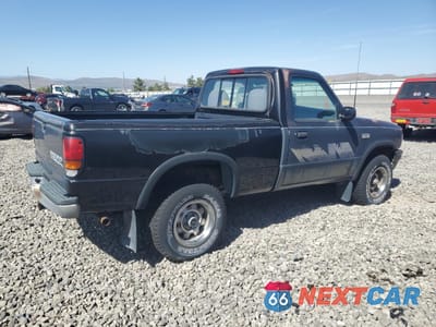 Trzecie zdjęcie samochodu z tyłu: 1994 MAZDA B4000 VIN:4F4CR13X1RTM14764 - miniatura