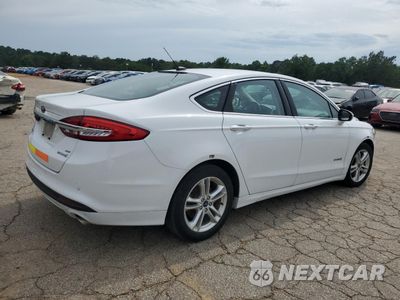 Trzecie zdjęcie samochodu z tyłu: 2018 FORD FUSION SE HYBRID VIN:3FA6P0LU5JR278744 - miniatura