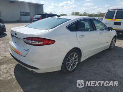 Trzecie zdjęcie samochodu z tyłu: 2017 FORD FUSION SE HYBRID VIN:3FA6P0LUXHR409404 - miniatura