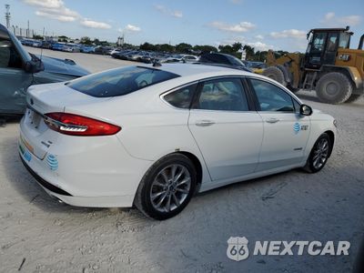 Trzecie zdjęcie samochodu z tyłu: 2017 FORD FUSION SE HYBRID VIN:3FA6P0LU6HR359679 - miniatura
