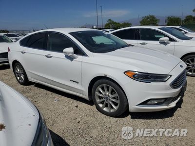 Czwarte zdjęcie samochodu z boku: 2017 FORD FUSION SE HYBRID VIN:3FA6P0LU8HR409191 - miniatura