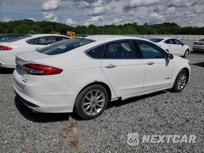 Trzecie zdjęcie samochodu z tyłu: 2017 FORD FUSION SE HYBRID VIN:3FA6P0LU1HR359542 - miniatura