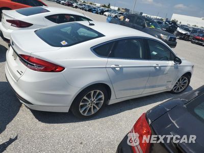 Trzecie zdjęcie samochodu z tyłu: 2017 FORD FUSION SE HYBRID VIN:3FA6P0LU3HR409647 - miniatura