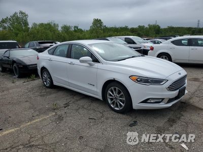 Czwarte zdjęcie samochodu z boku: 2017 FORD FUSION SE HYBRID VIN:3FA6P0LUXHR400718 - miniatura