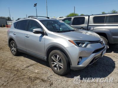 Czwarte zdjęcie samochodu z boku: 2018 TOYOTA RAV4 ADVENTURE VIN:JTMRFREV7JD247105 - miniatura