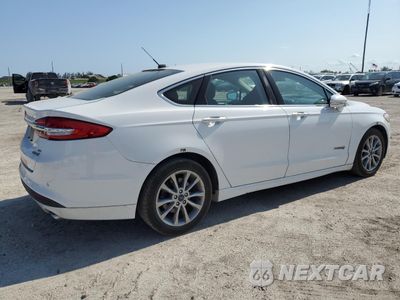 Trzecie zdjęcie samochodu z tyłu: 2017 FORD FUSION SE HYBRID VIN:3FA6P0LU8HR410048 - miniatura