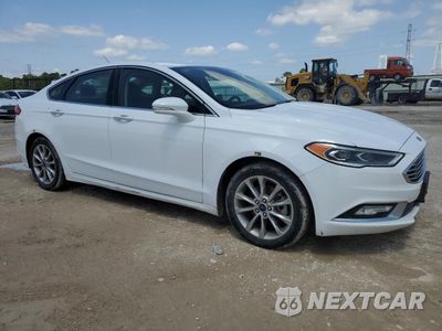 Czwarte zdjęcie samochodu z boku: 2017 FORD FUSION SE HYBRID VIN:3FA6P0LU1HR408903 - miniatura