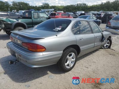 Trzecie zdjęcie samochodu z tyłu: 1993 PONTIAC BONNEVILLE SE VIN:1G2HX53L2P1272186 - miniatura