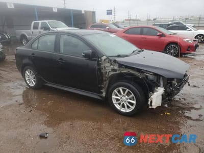 Czwarte zdjęcie samochodu z boku: 2016 MITSUBISHI LANCER ES VIN:JA32U2FU4GU010096 - miniatura