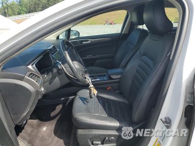 Zdjęcie 7 z 12 samochodu: 2017 FORD FUSION SE HYBRID VIN:3FA6P0LUXHR359538 - miniatura