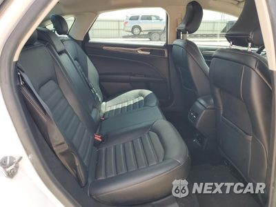 Zdjęcie 10 z 12 samochodu: 2017 FORD FUSION SE HYBRID VIN:3FA6P0LU3HR409003 - miniatura