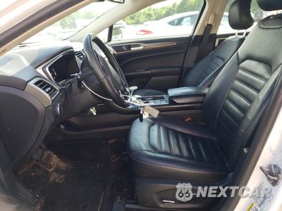 Zdjęcie 7 z 12 samochodu: 2017 FORD FUSION SE HYBRID VIN:3FA6P0LU2HR359596 - miniatura