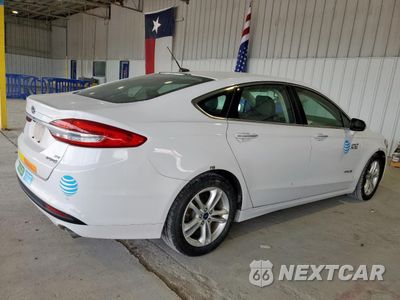 Trzecie zdjęcie samochodu z tyłu: 2018 FORD FUSION SE HYBRID VIN:3FA6P0LU0JR178468 - miniatura