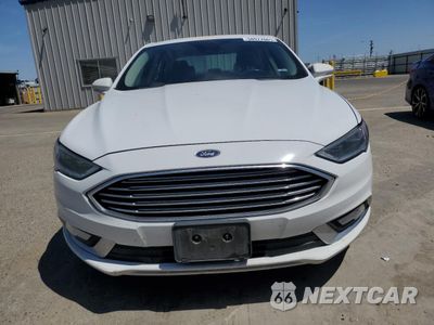 Piąte zdjęcie samochodu w środku: 2017 FORD FUSION SE HYBRID VIN:3FA6P0LU3HR400754 - miniatura