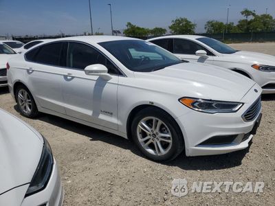 Czwarte zdjęcie samochodu z boku: 2018 FORD FUSION SE HYBRID VIN:3FA6P0LU8JR281864 - miniatura