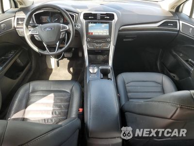 Zdjęcie 8 z 12 samochodu: 2018 FORD FUSION SE HYBRID VIN:3FA6P0LU2JR171912 - miniatura