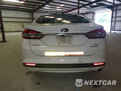 Zdjęcie 6 z 12 samochodu: 2018 FORD FUSION SE HYBRID VIN:3FA6P0LU6JR171797 - miniatura