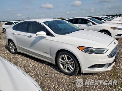 Czwarte zdjęcie samochodu z boku: 2018 FORD FUSION SE HYBRID VIN:3FA6P0LUXJR171687 - miniatura