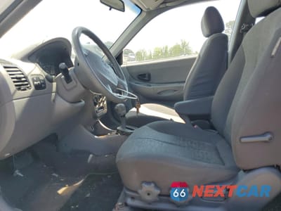 Zdjęcie 7 z 12 samochodu: 2005 HYUNDAI ACCENT GS VIN:KMHCG35C75U353506 - miniatura