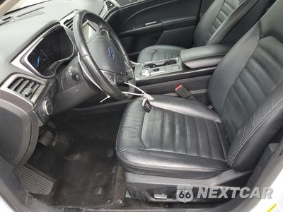Zdjęcie 7 z 12 samochodu: 2017 FORD FUSION SE HYBRID VIN:3FA6P0LU7HR409344 - miniatura