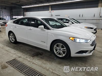 Czwarte zdjęcie samochodu z boku: 2018 FORD FUSION SE HYBRID VIN:3FA6P0LU0JR172086 - miniatura