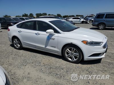 Czwarte zdjęcie samochodu z boku: 2018 FORD FUSION SE HYBRID VIN:3FA6P0LU1JR171559 - miniatura