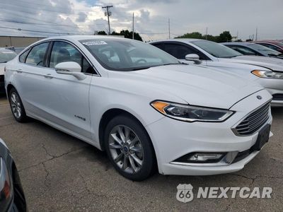 Czwarte zdjęcie samochodu z boku: 2017 FORD FUSION SE HYBRID VIN:3FA6P0LUXHR409144 - miniatura