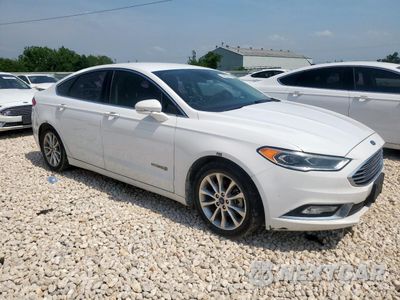 Czwarte zdjęcie samochodu z boku: 2017 FORD FUSION SE HYBRID VIN:3FA6P0LU9HR409040 - miniatura