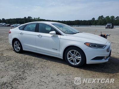 Czwarte zdjęcie samochodu z boku: 2018 FORD FUSION SE HYBRID VIN:3FA6P0LU7JR152448 - miniatura