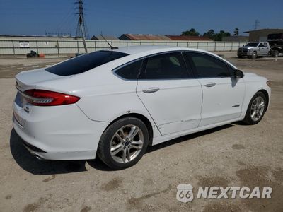 Trzecie zdjęcie samochodu z tyłu: 2018 FORD FUSION SE HYBRID VIN:3FA6P0LU2JR171683 - miniatura