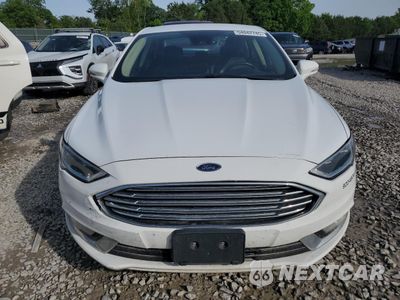 Piąte zdjęcie samochodu w środku: 2017 FORD FUSION SE HYBRID VIN:3FA6P0LU4HR409222 - miniatura