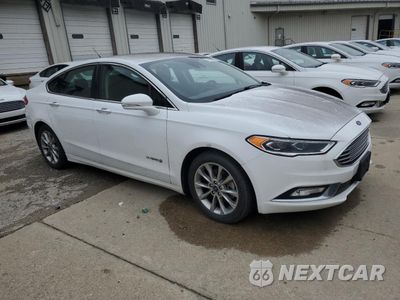 Czwarte zdjęcie samochodu z boku: 2017 FORD FUSION SE HYBRID VIN:3FA6P0LU2HR400745 - miniatura