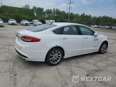 Trzecie zdjęcie samochodu z tyłu: 2017 FORD FUSION SE HYBRID VIN:3FA6P0LUXHR410097 - miniatura