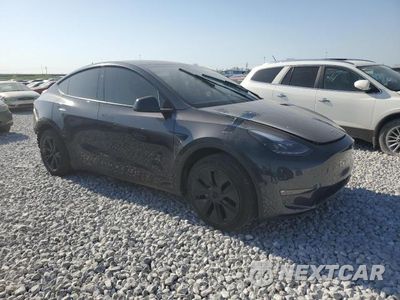 Czwarte zdjęcie samochodu z boku: 2024 TESLA MODEL Y VIN:7SAYGAEE2RF098765 - miniatura