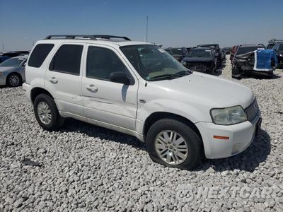Czwarte zdjęcie samochodu z boku: 2006 MERCURY MARINER VIN:4M2CU57106DJ05517 - miniatura
