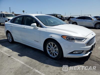 Czwarte zdjęcie samochodu z boku: 2017 FORD FUSION SE HYBRID VIN:3FA6P0LU5HR409729 - miniatura