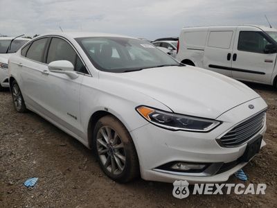 Czwarte zdjęcie samochodu z boku: 2017 FORD FUSION SE HYBRID VIN:3FA6P0LU5HR409066 - miniatura