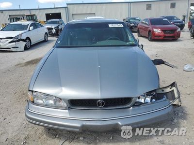 Piąte zdjęcie samochodu w środku: 1993 PONTIAC BONNEVILLE SE VIN:1G2HX53L2P1272186 - miniatura