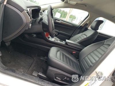 Zdjęcie 7 z 12 samochodu: 2018 FORD FUSION SE HYBRID VIN:3FA6P0LU8JR178458 - miniatura