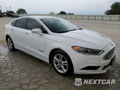 Czwarte zdjęcie samochodu z boku: 2018 FORD FUSION SE HYBRID VIN:3FA6P0LU9JR118737 - miniatura