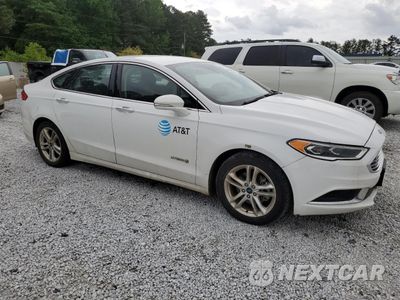Czwarte zdjęcie samochodu z boku: 2018 FORD FUSION SE HYBRID VIN:3FA6P0LU3JR171790 - miniatura