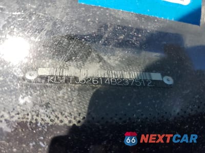 Zdjęcie 12 z 12 samochodu: 2004 CHEVROLET AVEO LS VIN:KL1TJ52614B237512 - miniatura